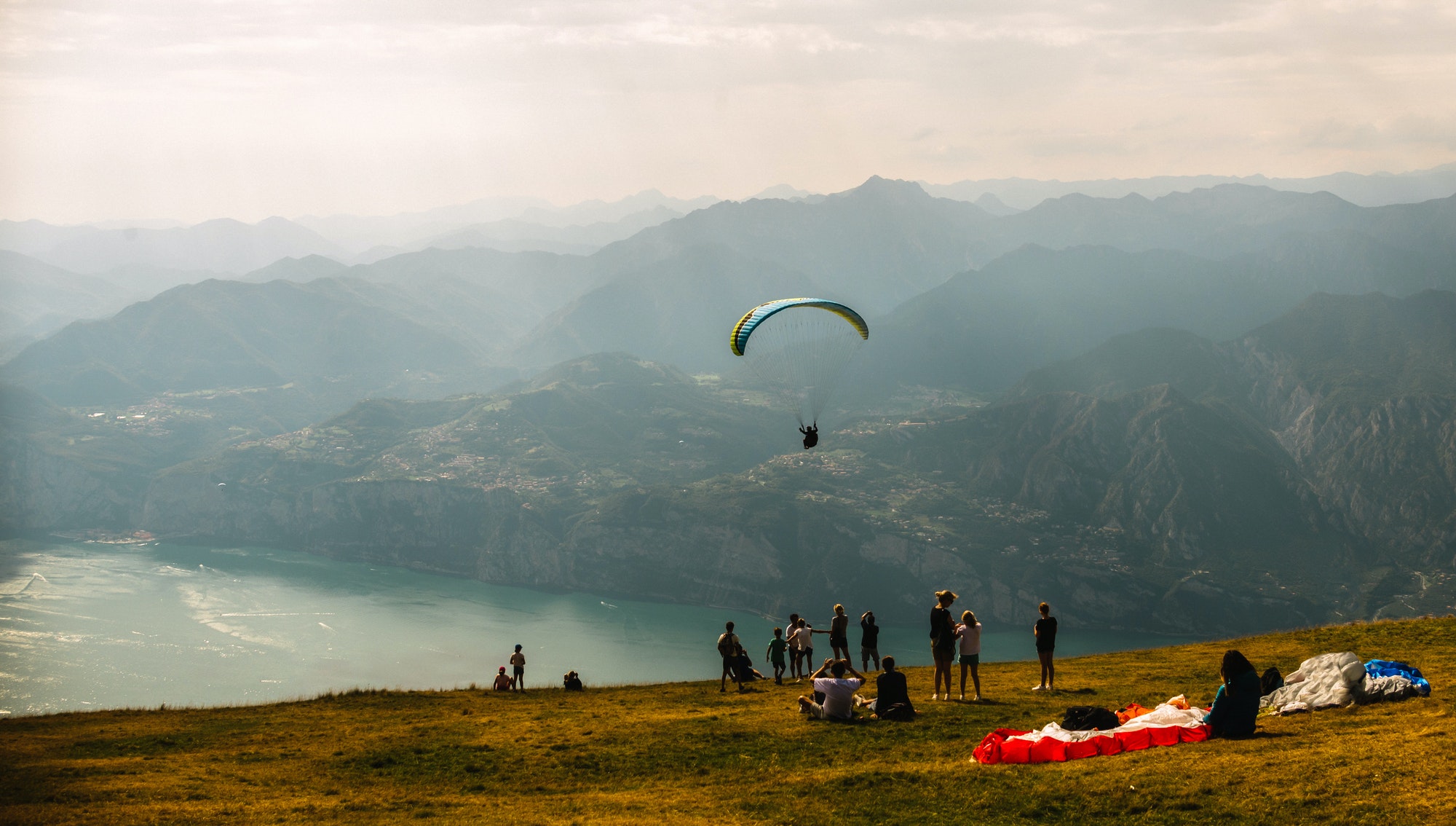 Paraglider on Mote Baldo andl ake Garda in Italy